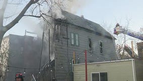 Crews battle fire at 3-story home in Logan Square