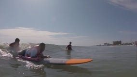 Wounded Warriors go surfing at New Smyrna Beach