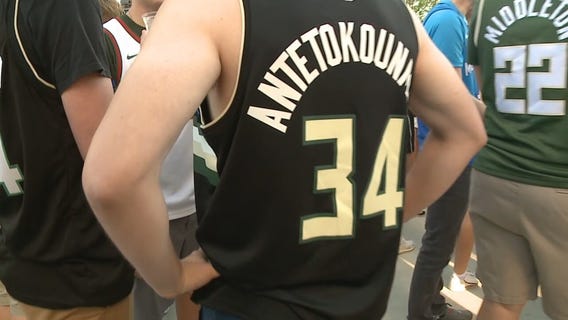 Bucks fans wear number 34 with Giannis out of Game 5