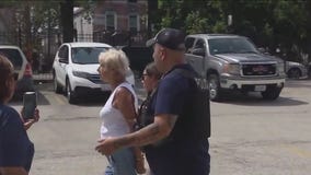 Tense moments at St. Adalbert's Church as woman confronts workers over stained glass removal"