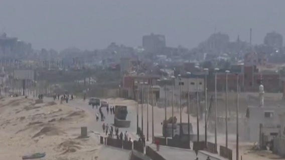 Trucks transport aid from new Gaza pier
