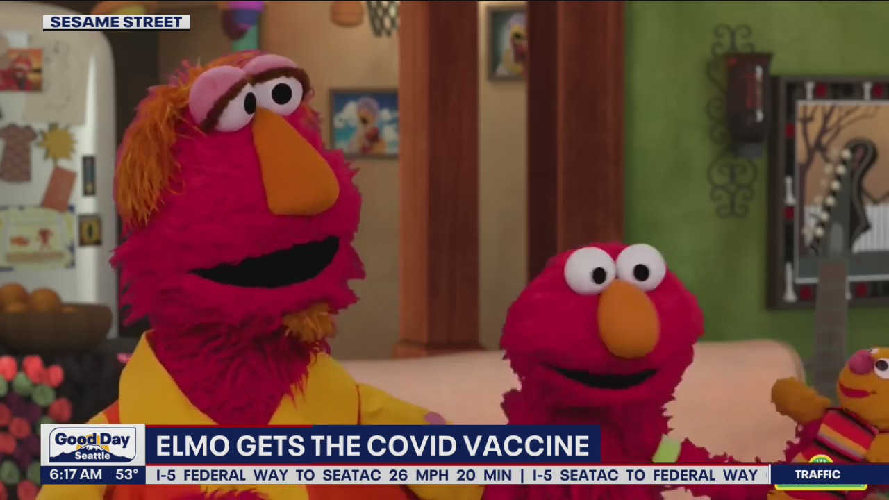 Elmo gets the COVID vaccine