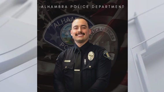 Pursuit driver charged with murder in officer's death