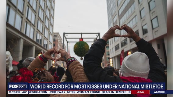 DC breaks world record for most kisses under national mistletoe