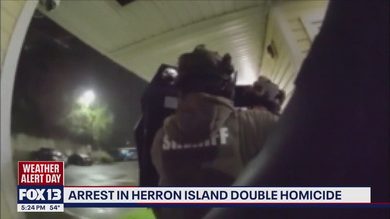 Suspect arrested after two people found dead in Heron Island home