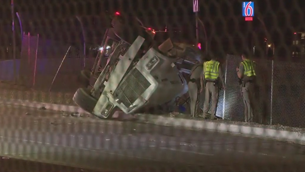 Cement truck rolls over on I-10 on-ramp