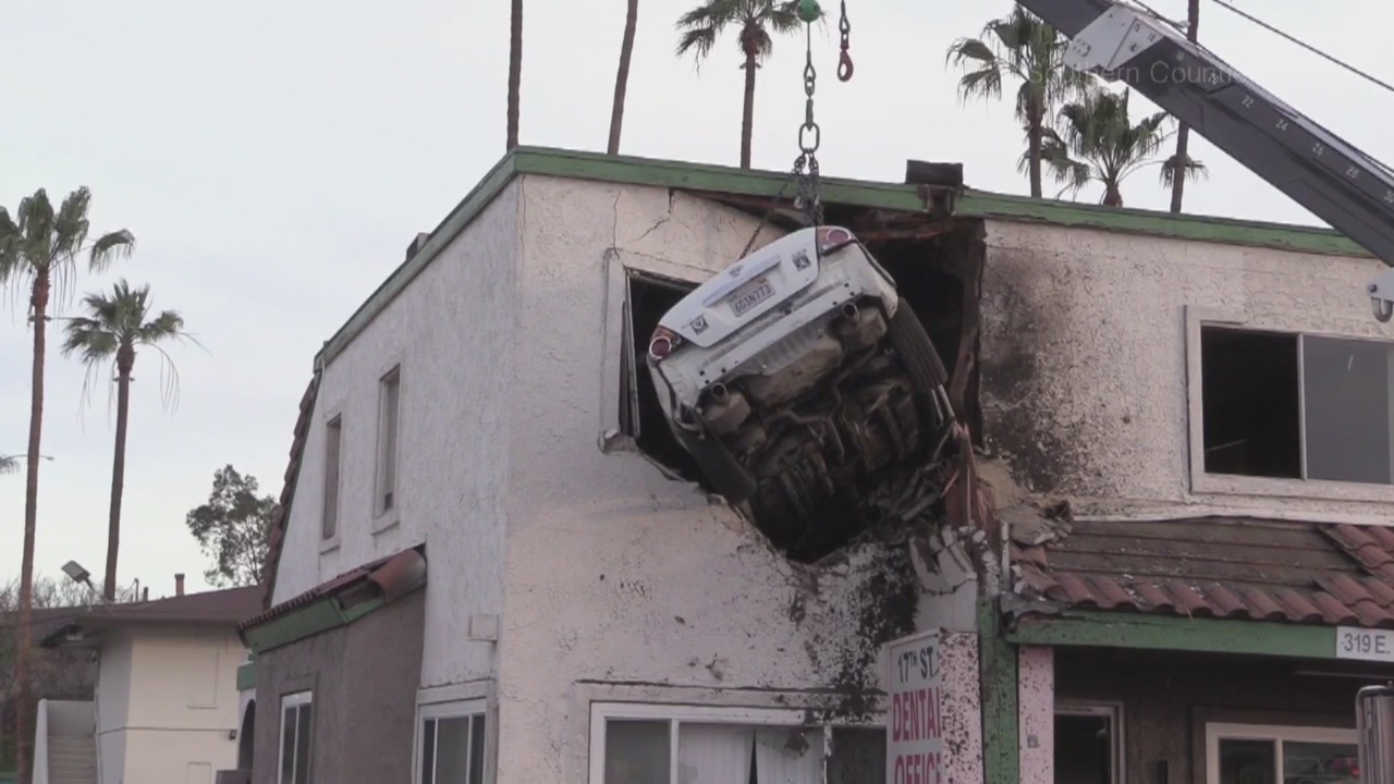 Car crashes into second floor of Santa Ana building