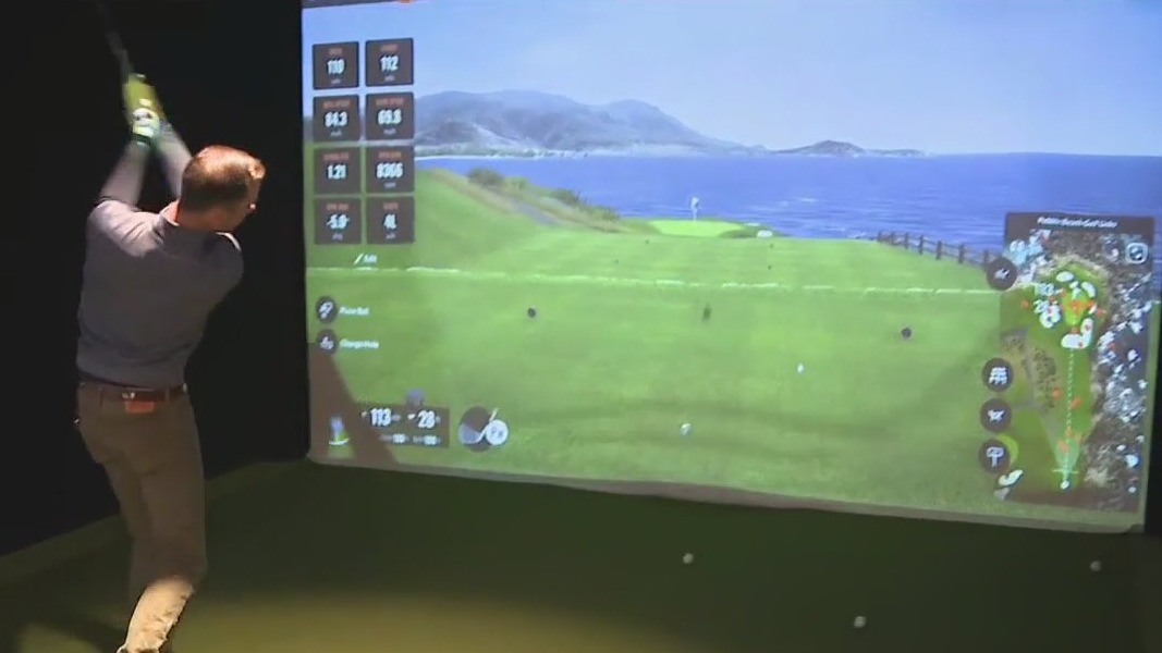 Having a ball at Midtown's Five Iron Golf