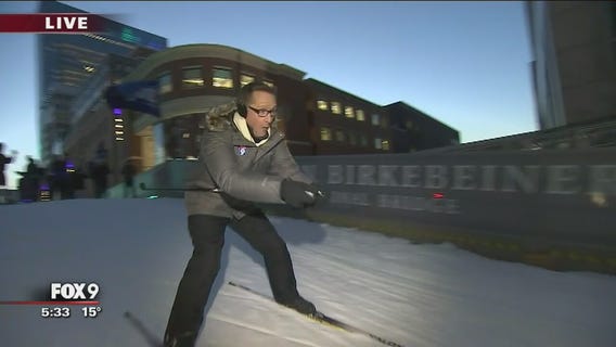 Fox 9's Ian Leonard skis down Birkie Bridge at Super Bowl LIVE
