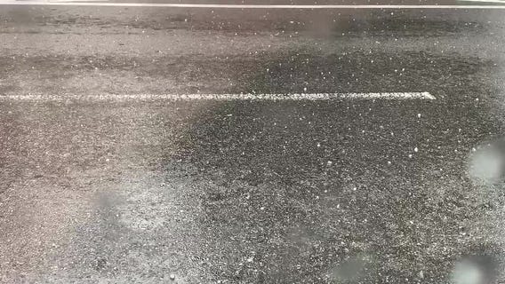 Hail during a thunderstorm on 20th Street, near the Parkway