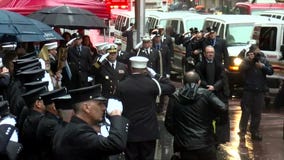 Slutman funeral: Taps