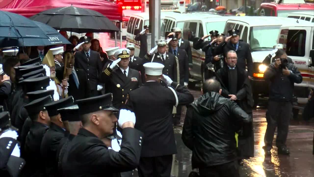 Slutman funeral: Taps