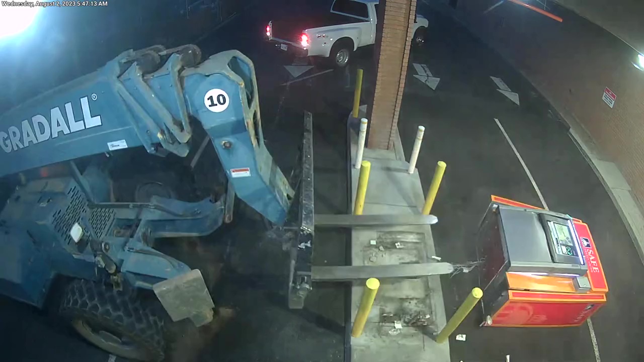 Suspects use forklift to steal ATM machine