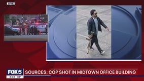 Cop shot in Manhattan office building, active shooter 'neutralized'