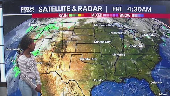 Tylia helps Rob with the weather