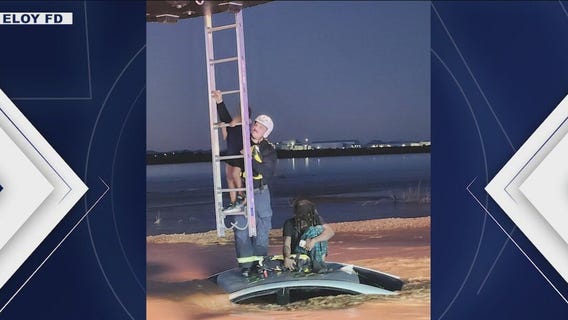 5-year-old, man found clinging to roof of submerged vehicle in Eloy