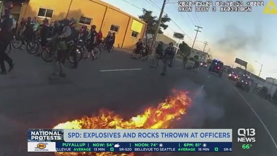 Explosives and rocks thrown at Seattle Police officers