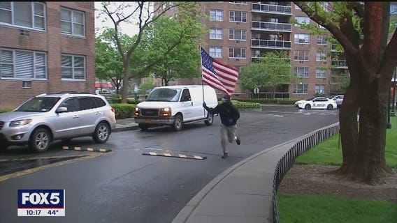 Immigrant gives nightly patriotic salute to heroes to raise spirits