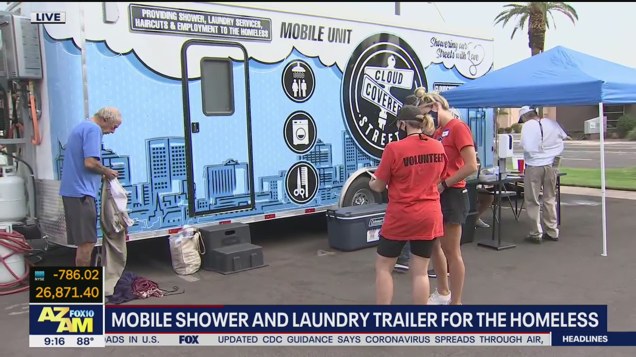 Mobile shower and laundry trailer for homeless