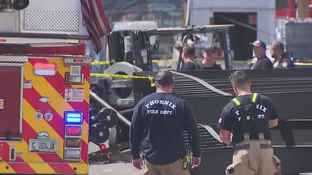 Man gets trapped underneath car axles