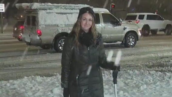 Clearing snow as winter storm continues