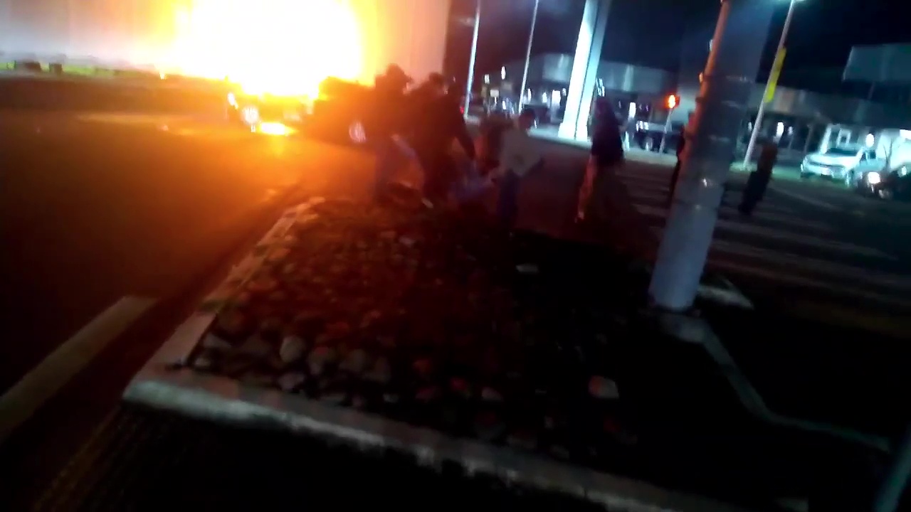 Civilians rescue state trooper from burning car