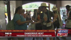 Teens in the Valley for church youth conference helping others beat the Valley heat