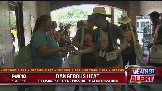 Teens in the Valley for church youth conference helping others beat the Valley heat