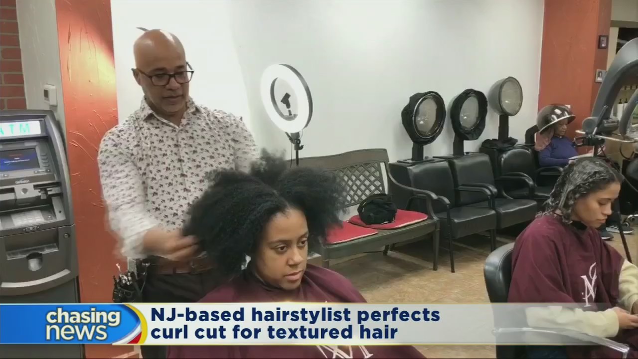 Stylist perfects curl cut for textured hair