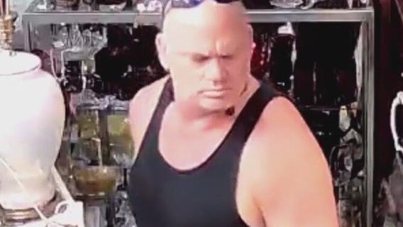 Caught on camera: Man in kilt seeing doing unusual things to antiques