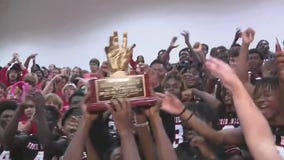 Raising the HIGH 5 Sports TOTW trophy at Druid Hills High