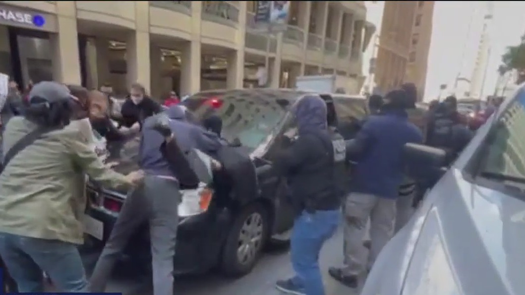 Protesters clash with law enforcement over ICE arrests