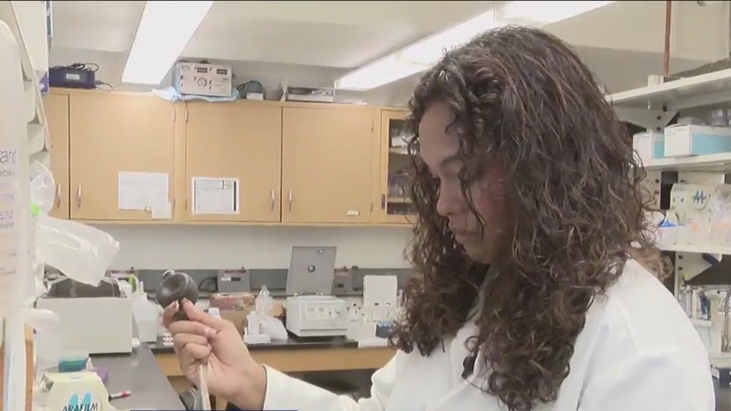 Childhood cancer survivor helping with cancer research