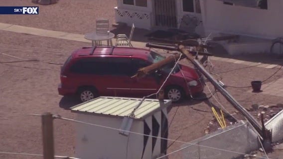 Power pole crashes into van, house in Apache Junction