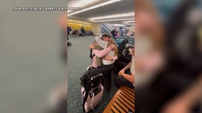 Watch: Airman surprises siblings at Orlando International Airport as early Christmas gift