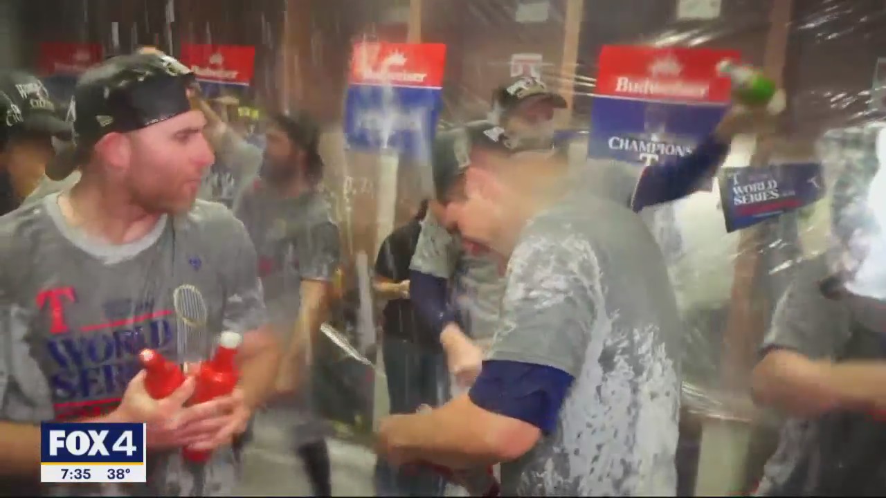 Texas Rangers players celebrate their World Series win