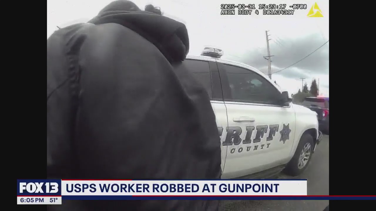 Man arrested after USPS worker robbed at gunpoint | FOX 13 Seattle