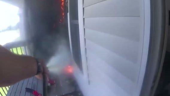 Fond du Lac County deputy extinguishes fire, rescues dog