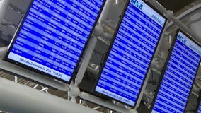 Holiday travelers at Milwaukee Mitchell Airport