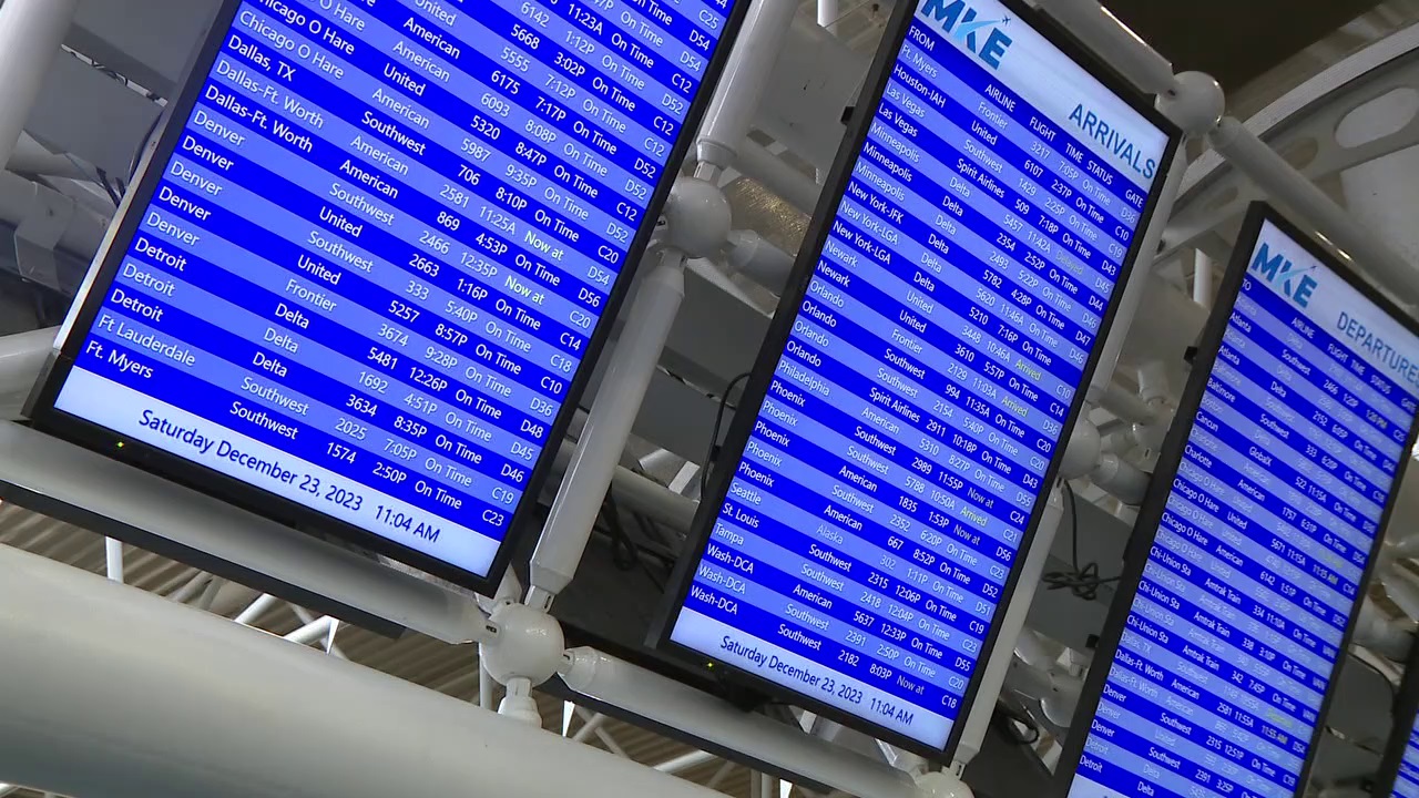Holiday travelers at Milwaukee Mitchell Airport