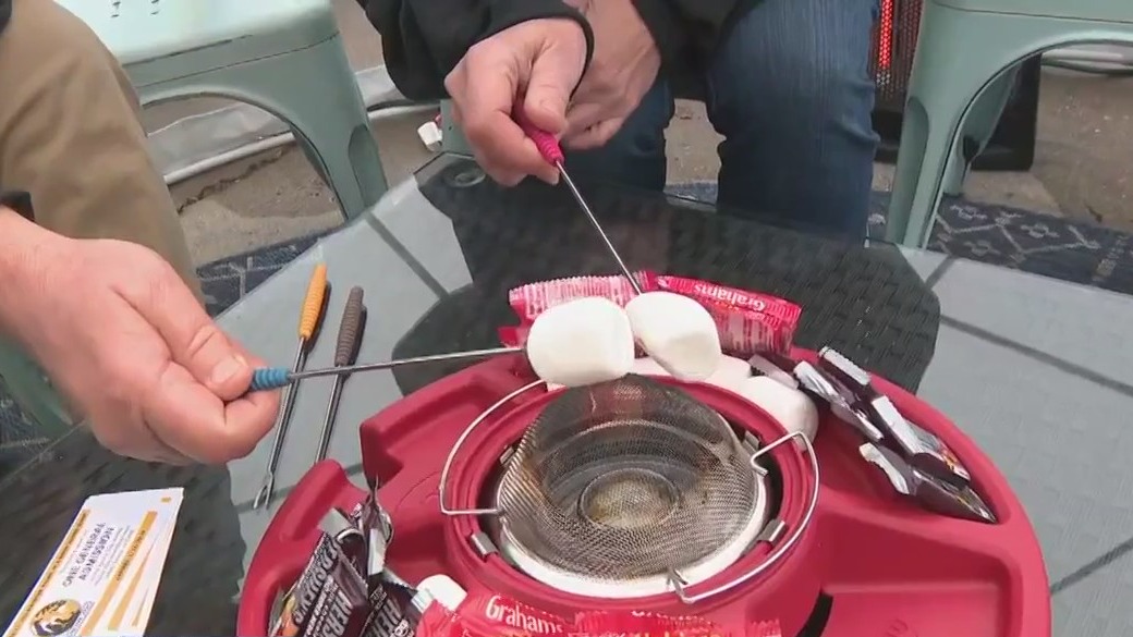 Enjoying a 'Winter Picnic in a Snow Globe'