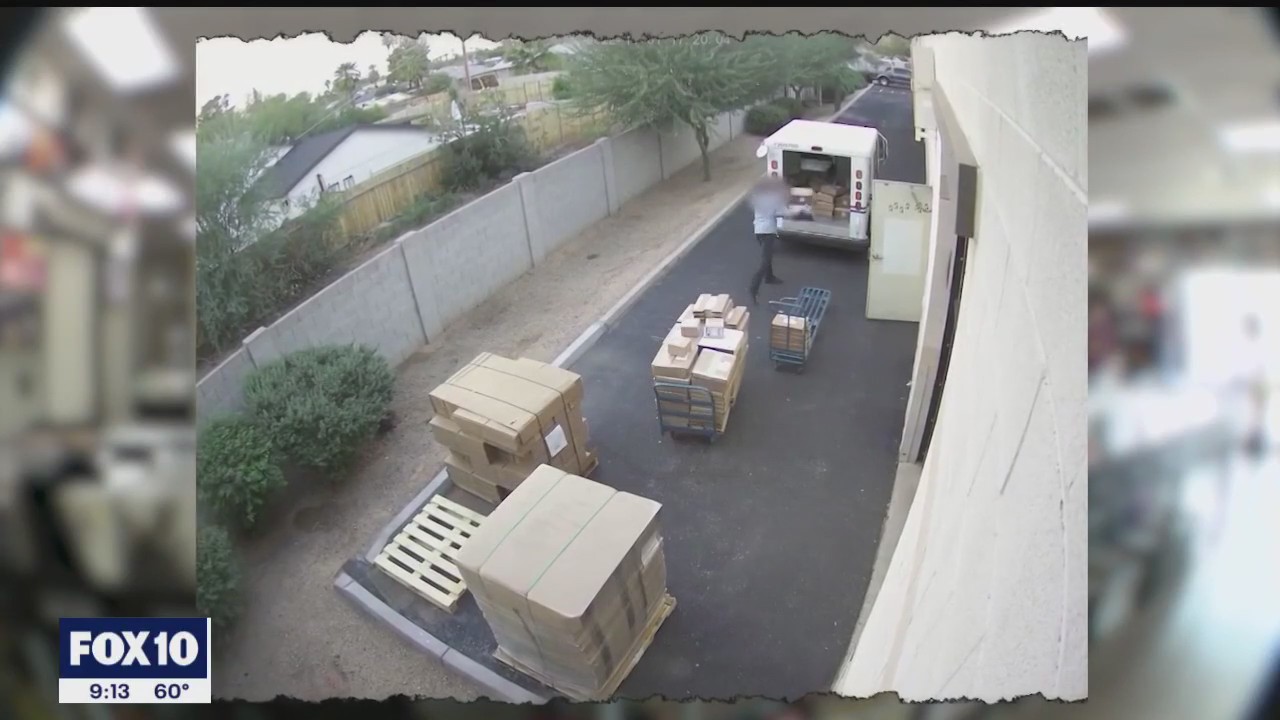 Postal worker caught on camera behaving badly