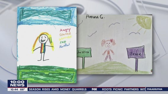 Teacher using art therapy to help children