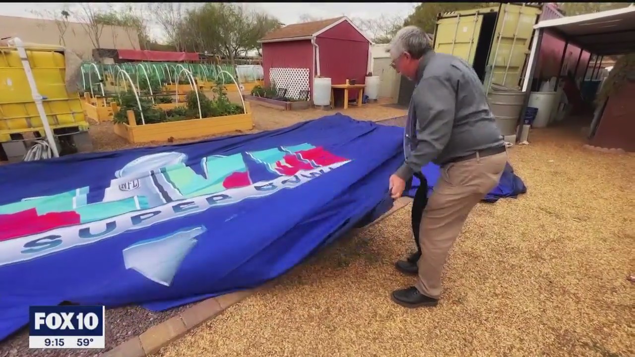 BTS: Taking down massive Super Bowl signs