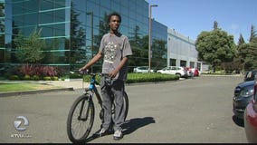 Teen who walked 2 hours to work surprised by cop who buys him bike
