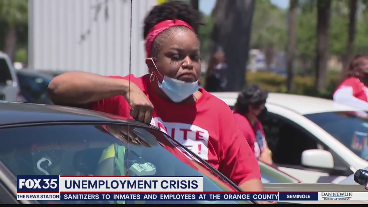 Protesters join car caravan to protest unemployment crisis