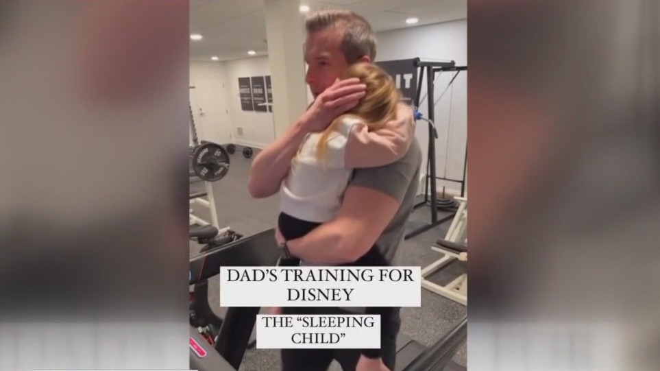 Video of dad training for family trip to Disney World goes viral
