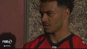 Once in coma, H.S. football player who was shot makes comeback