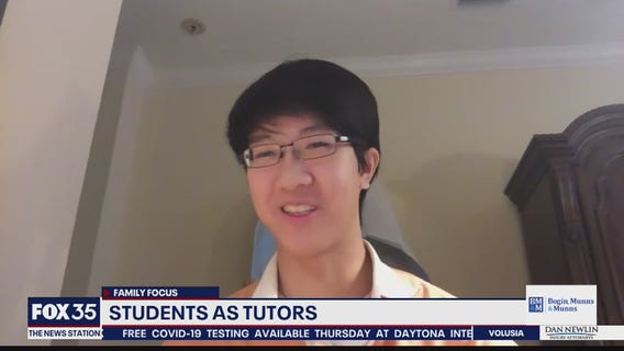 Students helping parents with distance learning as tutors