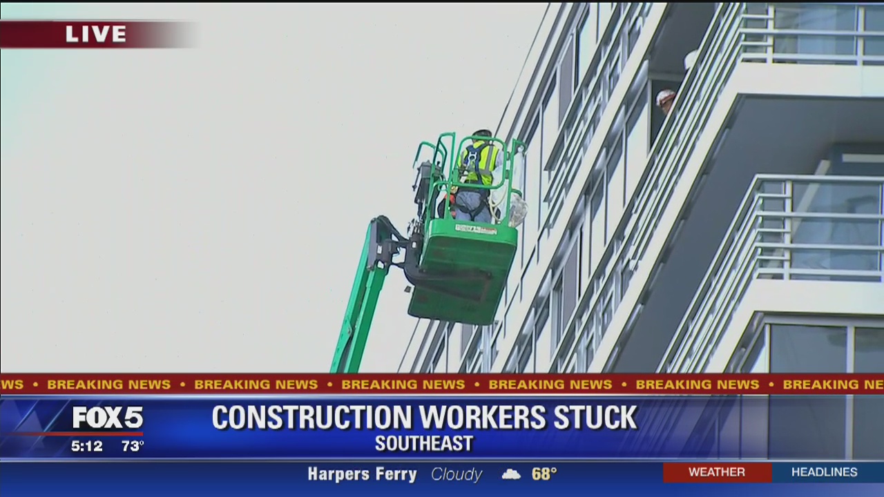 2 construction workers stuck on disabled boom lift in DC | FOX 5 DC